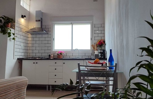 Buen Paso Apartment | Sunny balcony, large garden and private parking, 10 minutes from the beach.