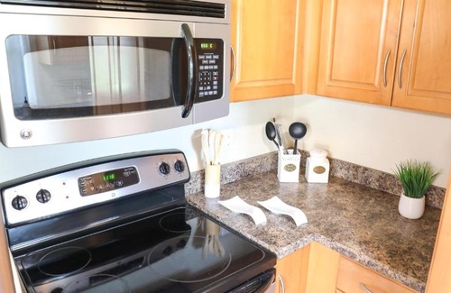 Anona Apartment | Sunnyside Palms - 2BR, Poolside, 5 min to Beach