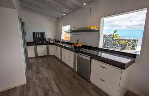 Malendure Villa | Sunset Palm - Creole villa with pool and view of the Cousteau Reserve