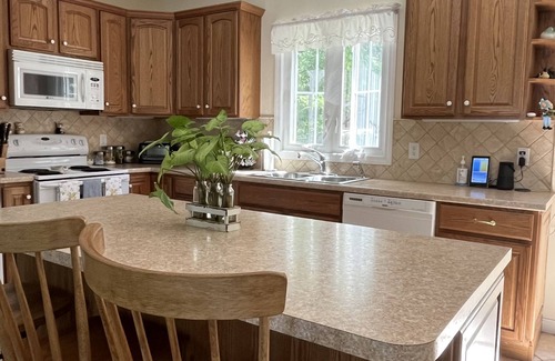 Sutton House | Sunset View Lake Front Home Rental