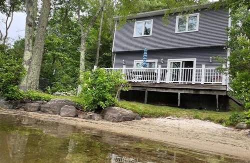 Sutton House | Sunset View Lake Front Home Rental