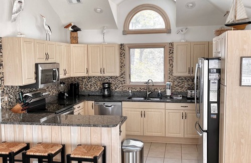 Corolla Light House | Sunset Views! Waterfront in Corolla Light. Pool, Hot Tub. Dog Friendly. Elevator