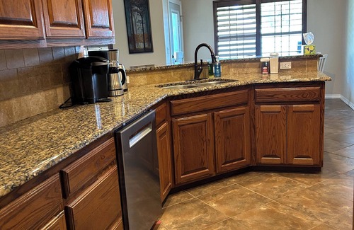 Clovis House | Sunshine Retreat with a game room, 4 bedrooms, and pet friendly.