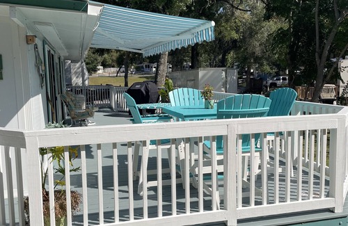 Fort McCoy Cottage | Super roomy Park Model in premier resort with lake, pools, dock and boat launch.