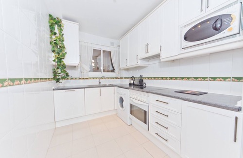 Urbanizacion Hacienda las Chapas Apartment | Superb Ground Floor Apartment in Tropical Gardens of Secure Complex - free WiFi