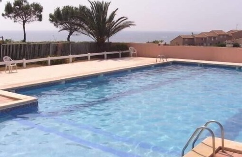 Saint-Pierre-la-Mer Apartment | T2 cabin sleeps 4, sea view terrace, swimming pool, close to sea and shops