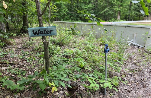 Benzonia RV Rental | Tent w/Mattresses on Private wooded camp site