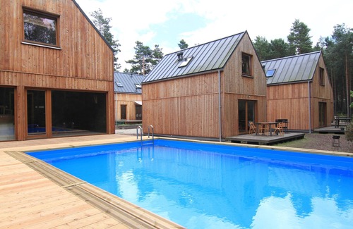 Osjakow Cottage | 'Terra' cottage in Small Family Friendly Resort in Forest upon Warta River