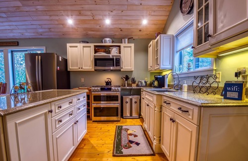 Rangeley House | The 4 Seasons on Mooselookmeguntic Lake with dock, mooring, 4 kayaks, fire pit, and pet friendly!