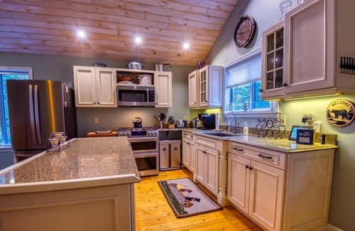 Rangeley House | The 4 Seasons on Mooselookmeguntic Lake with dock, mooring, 4 kayaks, fire pit, and pet friendly!