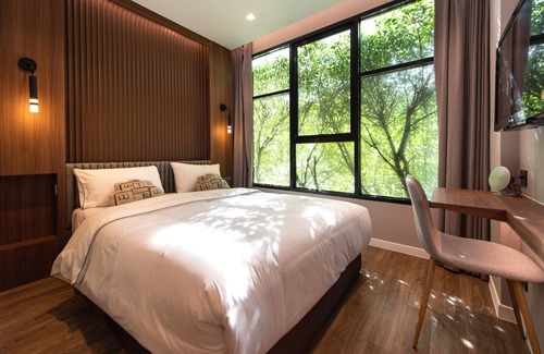 Khlong Kluea Hotel | The Botanic Service Room