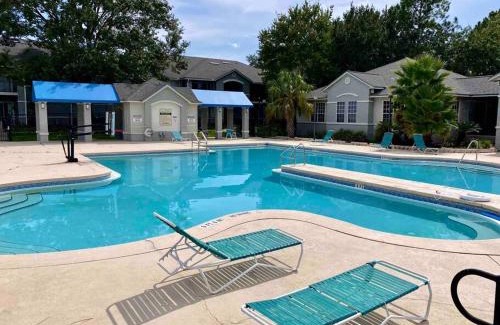 Gainesville Apartment | The Botanical Retreat, King Comfort & Poolside Peace