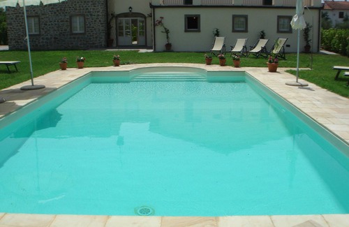 Cortona Villa | The Casine villa boasts seven apartments with a large Pool, free WiFi & parking