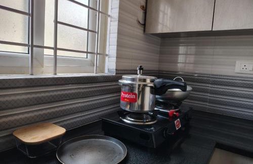 BTM 2nd Stage Hotel | The Cave Lakeview Suites 1BHK