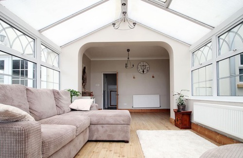 Porthcawl House | THE CLOCK HOUSE, luxury holiday cottage, with hot tub in Nottage