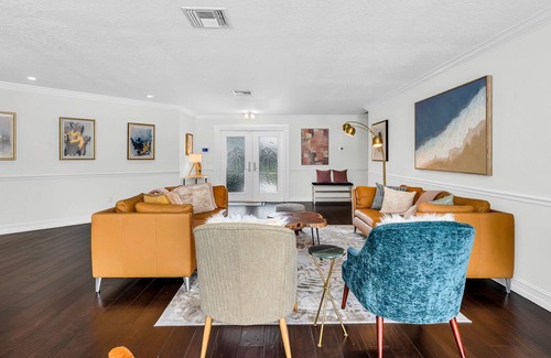 Lake Ida Shores House | The Coconut Canal Hideout- Waterfront, Heated Pool, Minutes to Downtown Delray!
