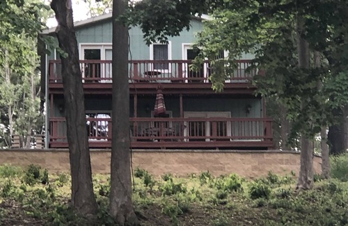 Bloomingdale House | The Copper Cottage. Bloomingdale, MI on AllSports Muskrat lake. 1800 sqft home.