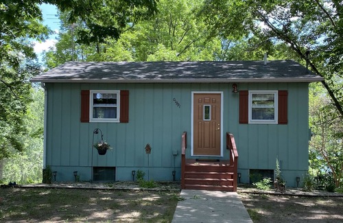 Bloomingdale House | The Copper Cottage. Bloomingdale, MI on AllSports Muskrat lake. 1800 sqft home.