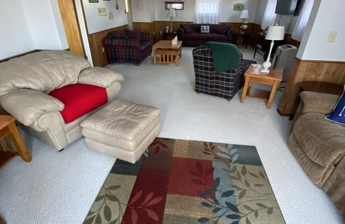 Bloomingdale House | The Copper Cottage. Bloomingdale, MI on AllSports Muskrat lake. 1800 sqft home.