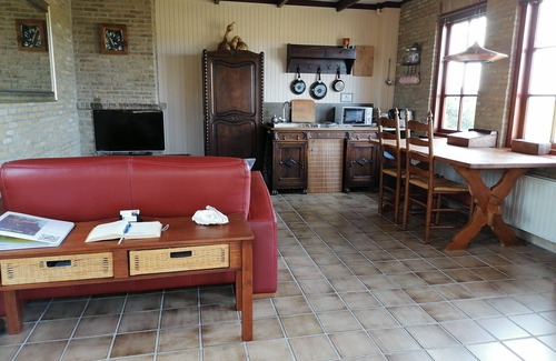 Zonnemaire Cottage | The Cottage is a detached holiday house at the foot of a dike with panorama view