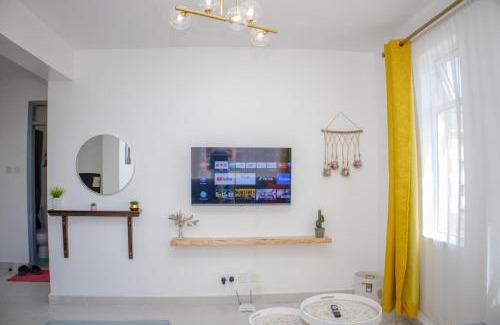 Riruta Apartment | The Cozy Nest with Pool, Gym and Netflix
