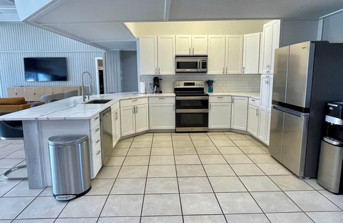 Pelican Bay House | The Grand Pelican - LakeFront W/ Pool, Sport Court, Fire Pit