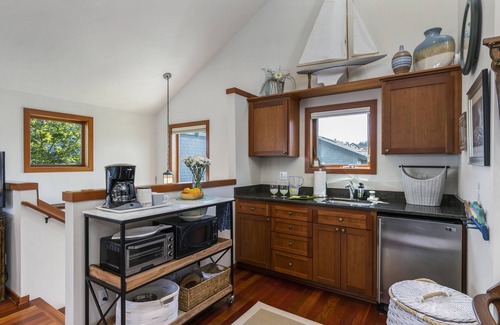 Indianola House | The Indianola BoathousenSleeps 2 in queen bed. Additional fees for 2 twin beds