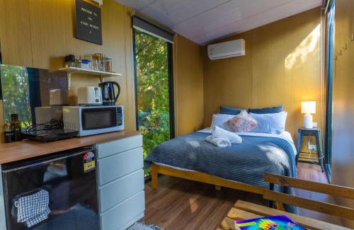 Waitoki House | The Kauri Sanctuary by Tiny Away