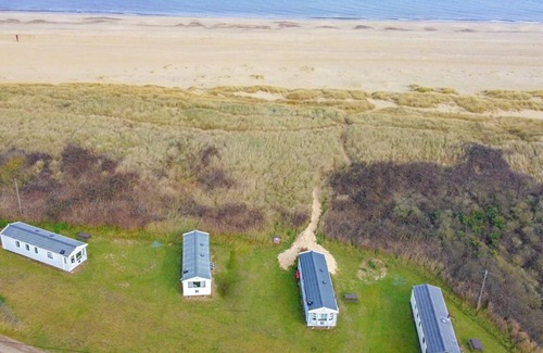 Irstead House | The new Delta is a two bed Caravan, with one double and one twin room.