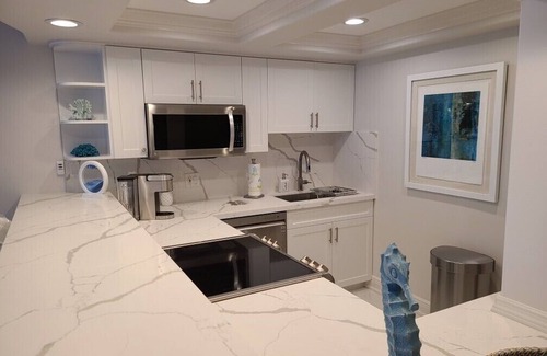 Deerfield Beach Condo | THE ONE! NEWLY RENOVATED GROUNDFLOOR BEACH/OCEAN FRONT CONDO with private deck!