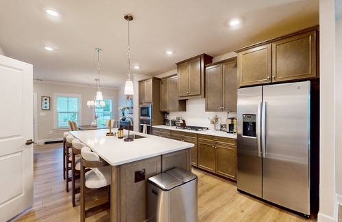 Long Neck Condo | The Peninsula spacious condo w/community pool, hot tub, tennis courts