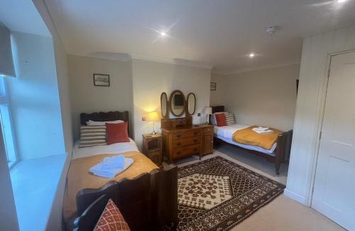 Cheltenham House | The Portland Guesthouse