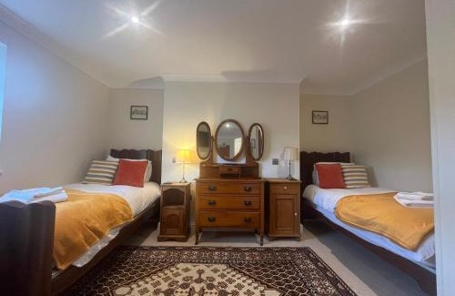 Cheltenham House | The Portland Guesthouse