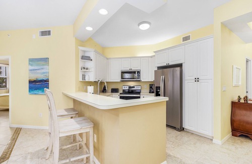 Vanderbilt Beach Condo | The Regatta Condo, Steps from Vanderbilt Beach, Spacious with Pool Views