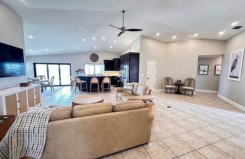 Caloosahatchee House | The River View 1008 - SE Cape Coral Riverfront Luxury Pool Home Pool Table and more
