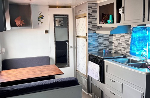 North Topsail Beach House | The Sandbox – Vintage Beach Camper with Prime Fishing Access