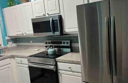 Sabal Harbour Condo | The Seabreeze Cottage with peaceful water views
