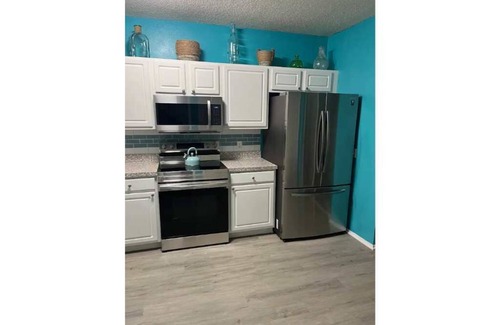 Sabal Harbour Condo | The Seabreeze Cottage with peaceful water views