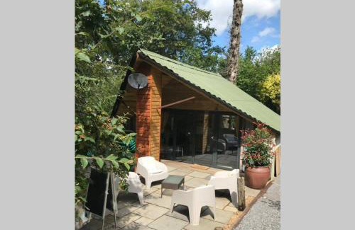 Cwm-twrch Isaf Apartment | The Shed . A cosy, peaceful, 96% recycled, chalet.