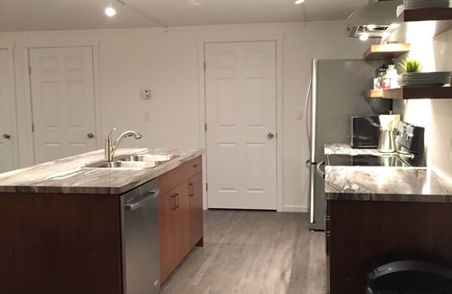 Revelstoke House | The Shop In Revy - Sleep Above Your Secure, Heated, Toy Storage