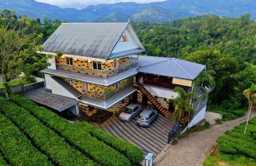 Kunchithanny Hotel | The Svarga Munnar Hill View resort