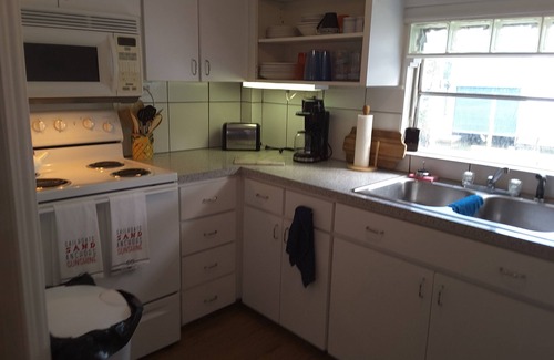 South Waterfront Park House | The Waters Edge 2/1 with Boat Dock in back yard