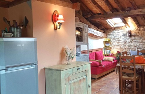 Yzeron Cottage | The yellow cottage, made of stone and wood