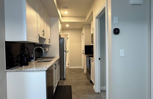 Southwest Calgary House | This fully furnish 2bedroom and a full bath gives you cozy & relaxing experience