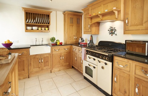 Great Longstone Cottage | This pretty limestone semi-detached cottage is in a quiet spot near Bakewell.