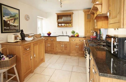 Great Longstone Cottage | This pretty limestone semi-detached cottage is in a quiet spot near Bakewell.