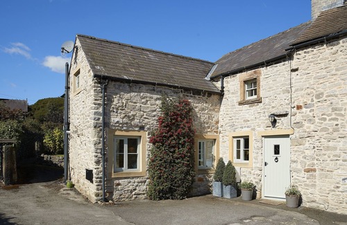 Great Longstone Cottage | This pretty limestone semi-detached cottage is in a quiet spot near Bakewell.