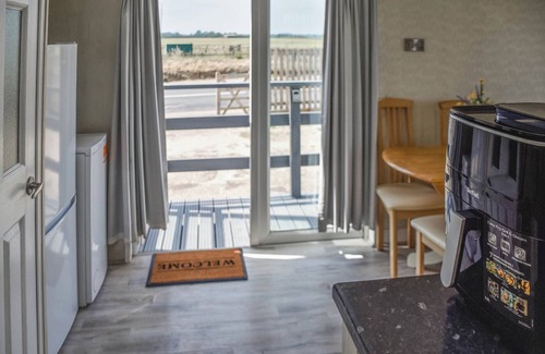 Bacton Cottage | This seaside retreat blends modern comfort with spectacular sea views.
