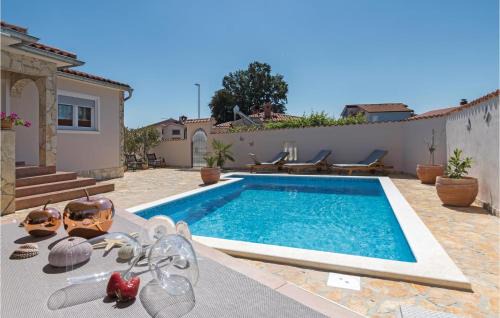 Barbariga House | Three-Bedroom Holiday Home Betiga With A Fireplace 02