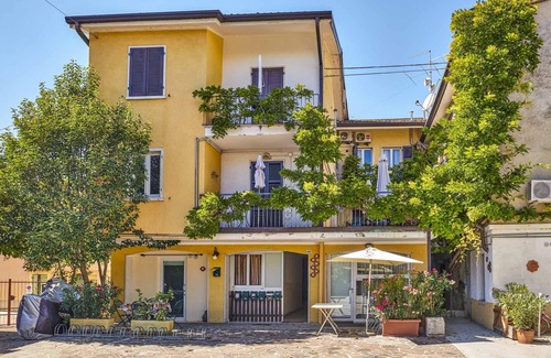 Lazise Apartment | Three-room apartment Lake Garda view wi-fi smart TV air conditioner table on terrace